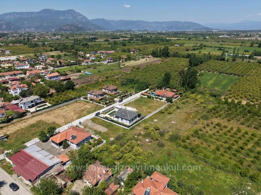 Land For Sale In Okçular, 1050M2, In The Village Residential Area.